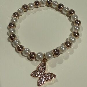 Elegant Pearl and Gold Butterfly Bracelet